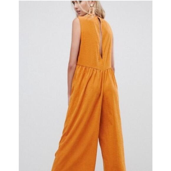 ASOS Minimal Jumpsuit with Ruching Detail and Keyhole Back in Mustard, 2 - Picture 3 of 10